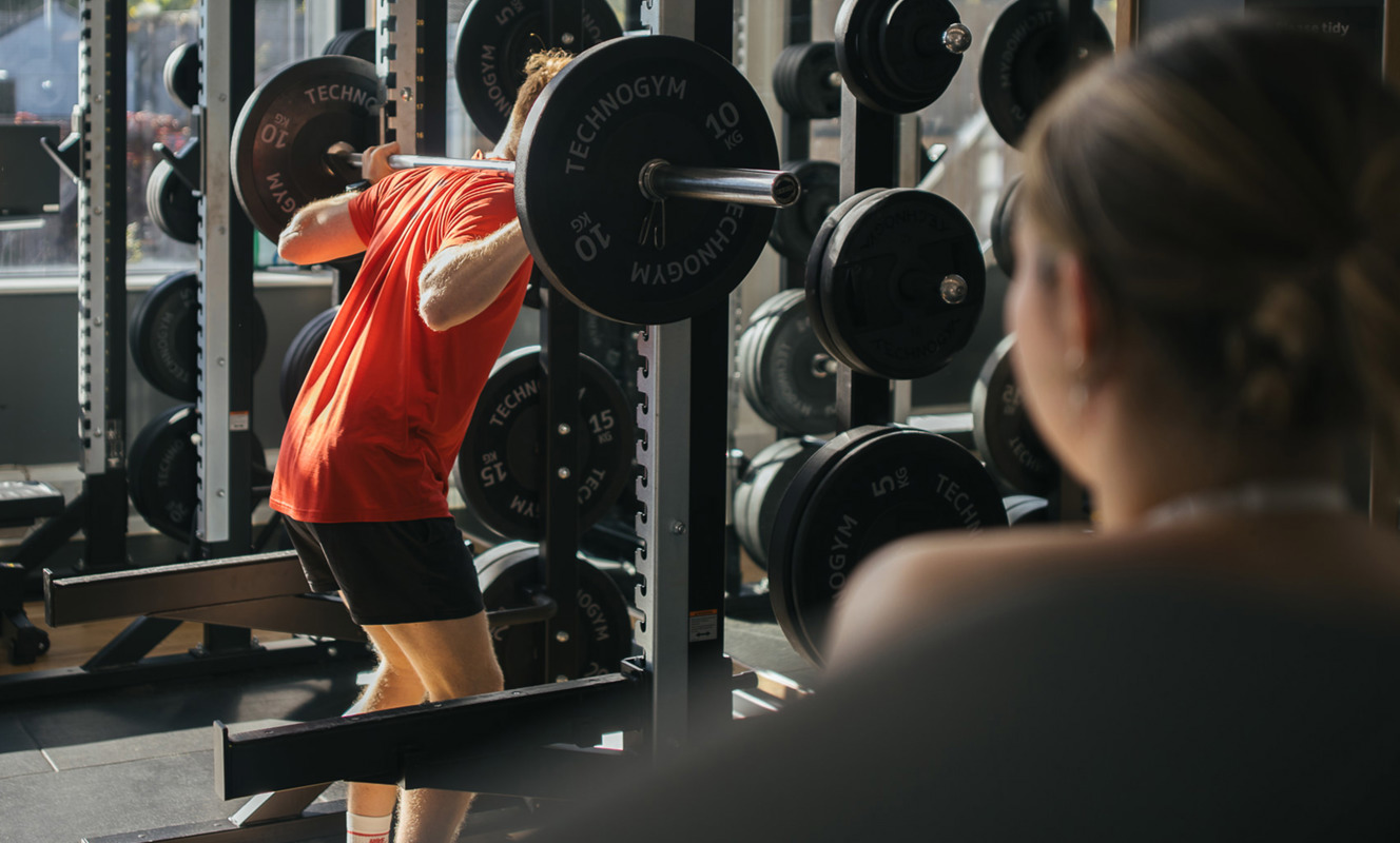 Finlake Man Lifting Weights